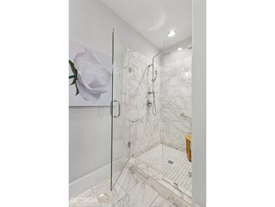 Indulge in luxury at this exquisite Triangle Park townhome. It's - photo 7