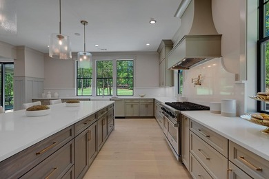 PRIVACY. CRAFTSMANSHIP. LIFESTYLE. NEW CUSTOM HOME PERFECTLY - photo 21