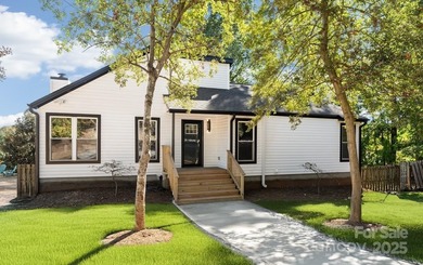 Lake Home For Sale in Tega Cay, South Carolina
