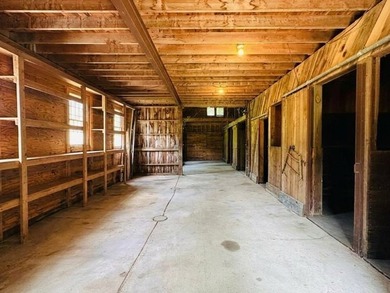 Welcome home to this stunning custom Ranch, featuring a barn - photo 36