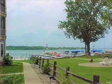 MOVE-IN READY CONDO ON WAWASEE LAKEFRONT IN ONE OF THE MOST COST - photo 3