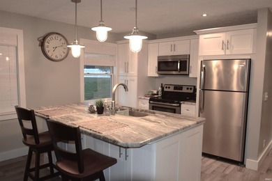 MOVE-IN READY CONDO ON WAWASEE LAKEFRONT IN ONE OF THE MOST COST - photo 6
