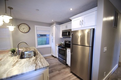 MOVE-IN READY CONDO ON WAWASEE LAKEFRONT IN ONE OF THE MOST COST - photo 7