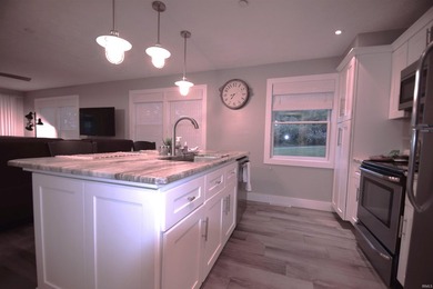 MOVE-IN READY CONDO ON WAWASEE LAKEFRONT IN ONE OF THE MOST COST - photo 8