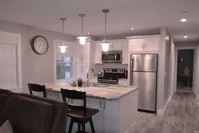 MOVE-IN READY CONDO ON WAWASEE LAKEFRONT IN ONE OF THE MOST COST - photo 9