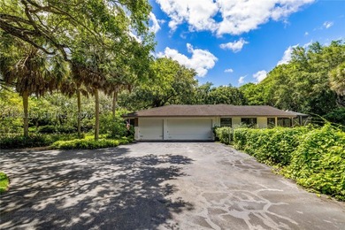 Set on approximately 1.75 acres within the gated community of - photo 25