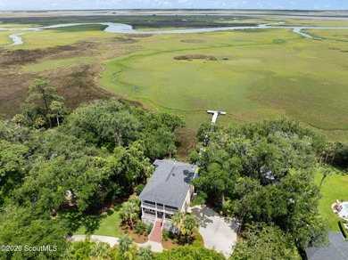 Your coastal oasis awaits! Exceptionally maintained custom-built - photo 42