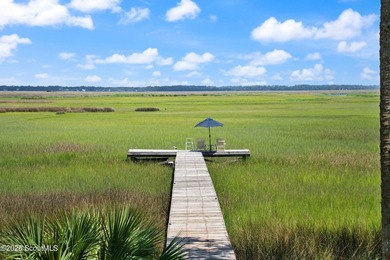 Your coastal oasis awaits! Exceptionally maintained custom-built - photo 45