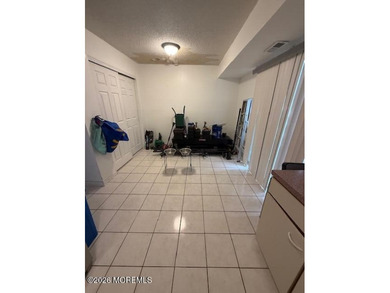 Two bedrooms, two full bathrooms, and a half bath, along with a - photo 3
