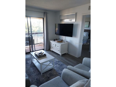 Beautifully updated, fully furnished 2-bedroom, 2-bath end-unit - photo 5