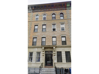 Investor Delight! This updated 4 Story Brick 8 Unit Multi-family - photo 1