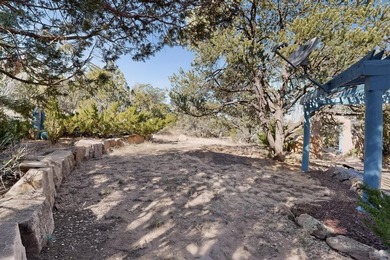 Surrounded by the open skies and hills of Canoncito, this - photo 33