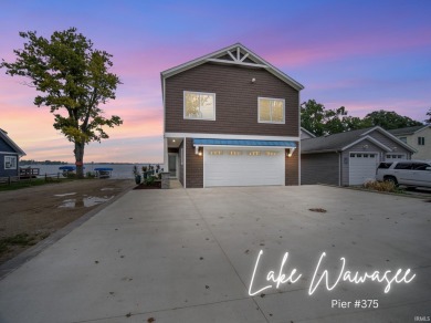 Welcome to Lakefront Living on Lake Wawasee! Are you ready to - Lake Home For Sale in Syracuse, Indiana