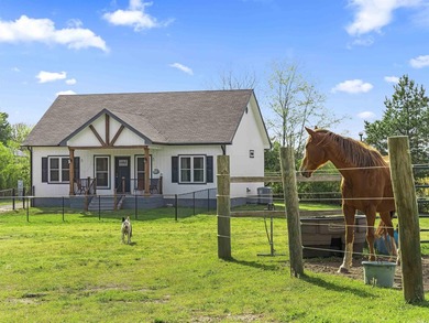 Check out this 20-acre equestrian estate! The property features - photo 1