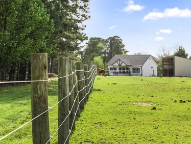 Check out this 20-acre equestrian estate! The property features - photo 4