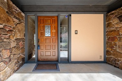 Private drive off a gated road leads to this home tucked among - photo 3