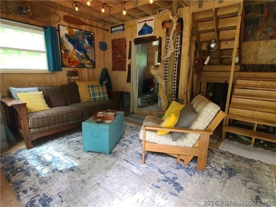 Featuring five acres of wooded privacy and a rustic cabin. Enjoy - photo 12