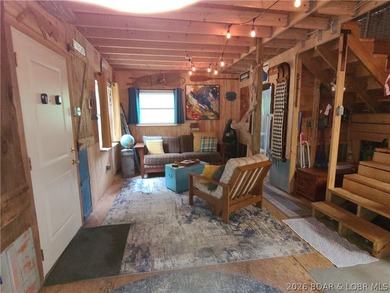 Featuring five acres of wooded privacy and a rustic cabin. Enjoy - photo 16