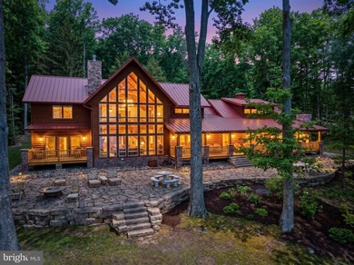 Stunning lakefront log home offering the perfect blend of rustic - photo 1