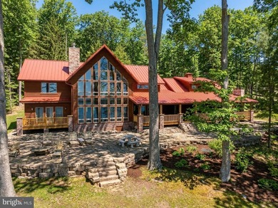 Stunning lakefront log home offering the perfect blend of rustic - photo 2