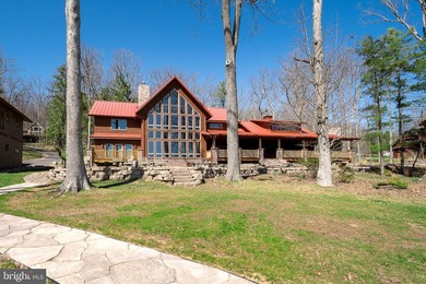 Stunning lakefront log home offering the perfect blend of rustic - photo 3