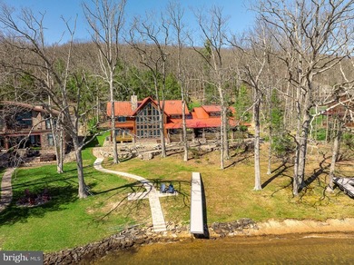 Stunning lakefront log home offering the perfect blend of rustic - photo 4