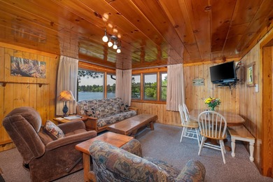 Situated on the crystal-clear shores of the stunning 1060-acre - photo 5