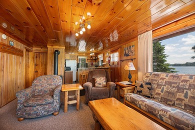 Situated on the crystal-clear shores of the stunning 1060-acre - photo 6