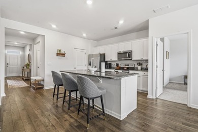 Welcome to easy, low-maintenance living in this beautifully - photo 7