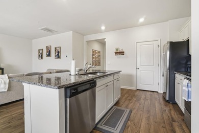 Welcome to easy, low-maintenance living in this beautifully - photo 8