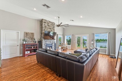 Nestled on an owned lot along the shores of Lake Nasworthy, this - photo 11