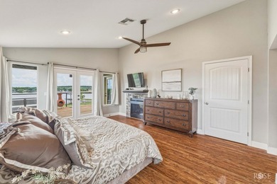 Nestled on an owned lot along the shores of Lake Nasworthy, this - photo 13