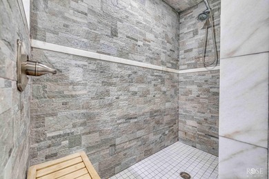Nestled on an owned lot along the shores of Lake Nasworthy, this - photo 16