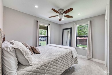 Nestled on an owned lot along the shores of Lake Nasworthy, this - photo 21