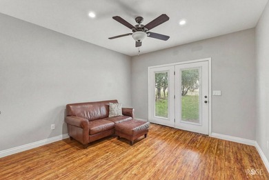 Nestled on an owned lot along the shores of Lake Nasworthy, this - photo 22