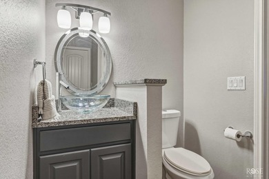 Nestled on an owned lot along the shores of Lake Nasworthy, this - photo 23