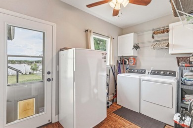 Nestled on an owned lot along the shores of Lake Nasworthy, this - photo 24