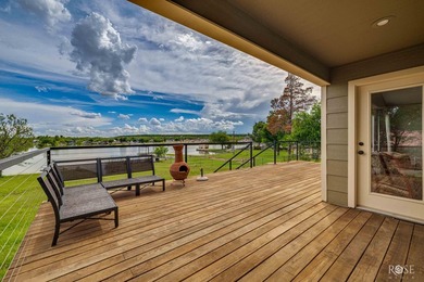 Nestled on an owned lot along the shores of Lake Nasworthy, this - photo 25
