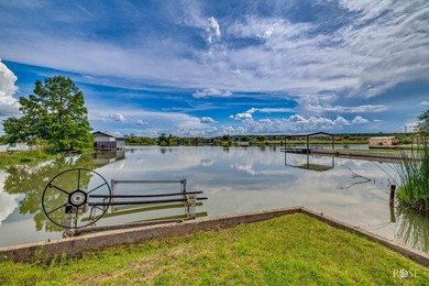 Nestled on an owned lot along the shores of Lake Nasworthy, this - photo 32