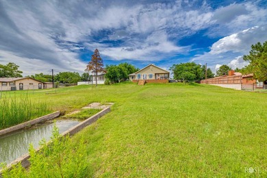 Nestled on an owned lot along the shores of Lake Nasworthy, this - photo 38