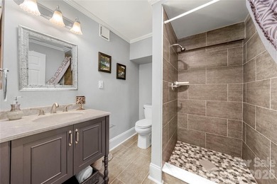 Recently transformed with a number of upgrades, this stunning - photo 39