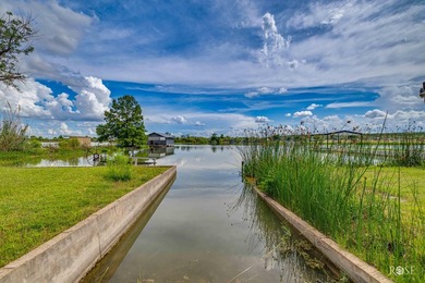 Nestled on an owned lot along the shores of Lake Nasworthy, this - photo 39