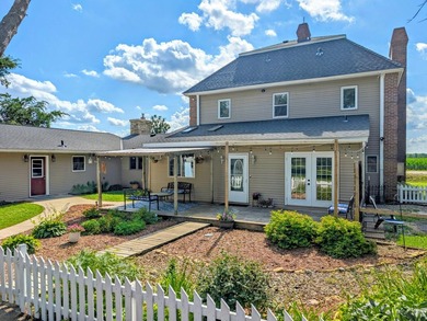 This stately brick home is a rare blend of timeless elegance - photo 4