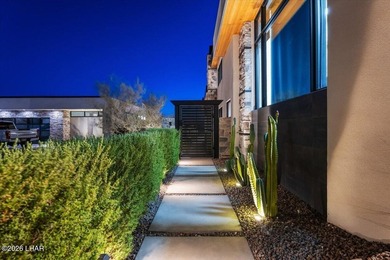 Experience elevated lakefront living in this exceptional Brady - photo 11