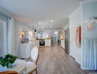 Welcome to this beautifully updated, fully furnished 3 bed 2