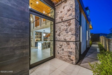 Experience elevated lakefront living in this exceptional Brady - photo 14