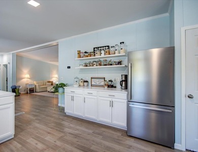 Welcome to this beautifully updated, fully furnished 3 bed 2