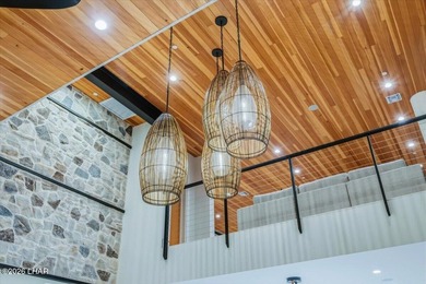 Experience elevated lakefront living in this exceptional Brady - photo 17
