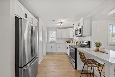 Beautifully rehabbed 3-bedroom, 1-bath home with a detached - photo 1