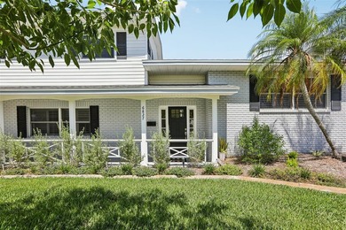 Welcome to this spacious 4-bedroom, 2-bath split-level home - photo 1